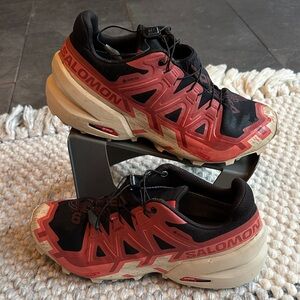 Salomon Black and Coral Trail Shoes